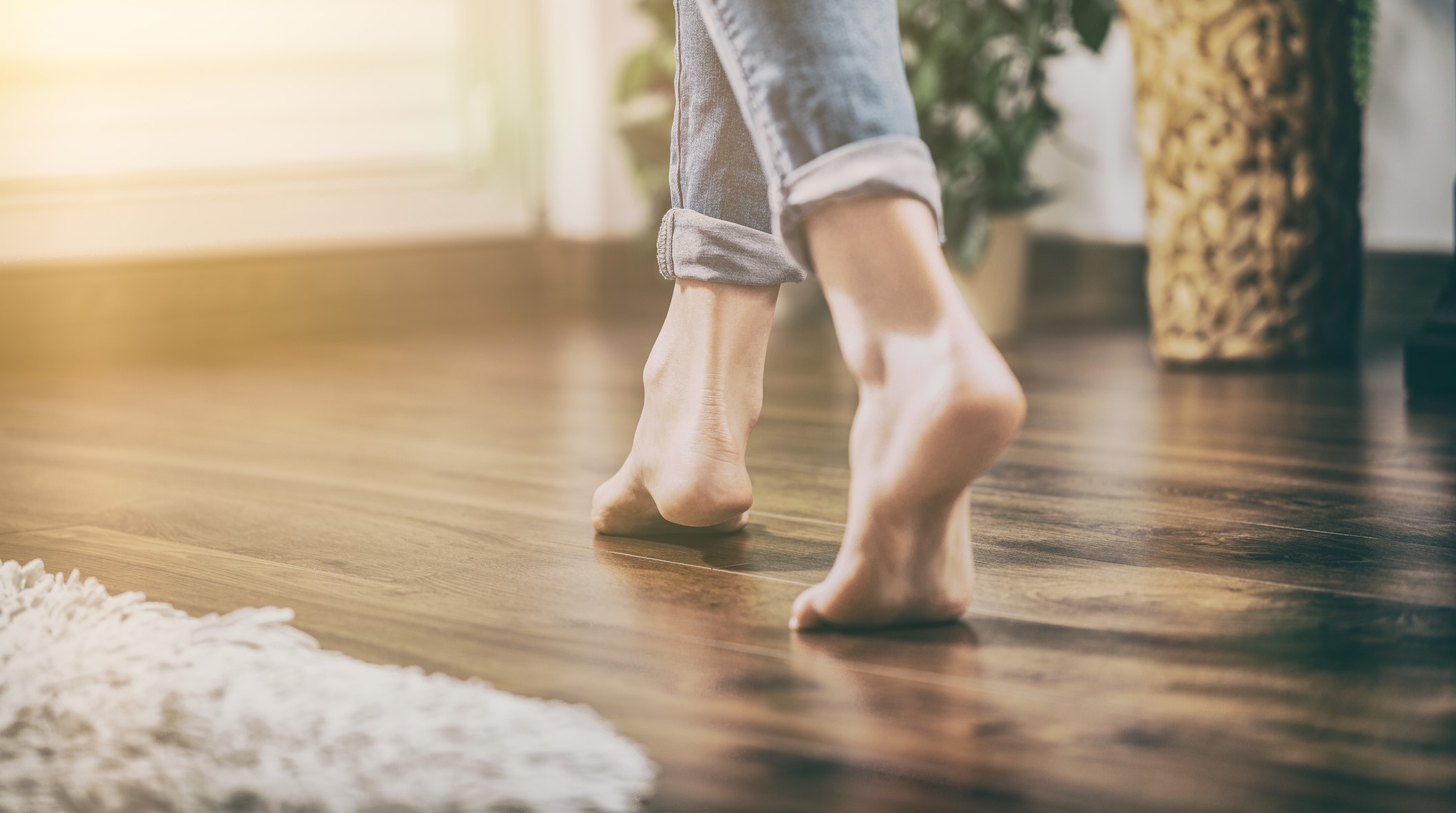 feet on wooden floor