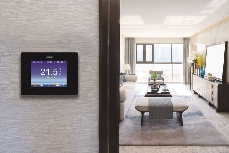 Room with a programmable Warmup thermostat.
