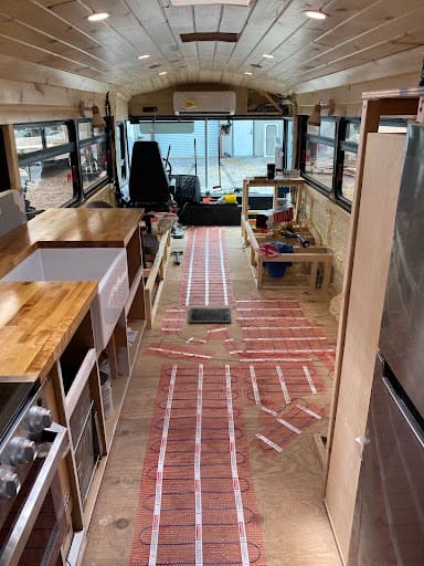 A tiny home with a StickyMat system.