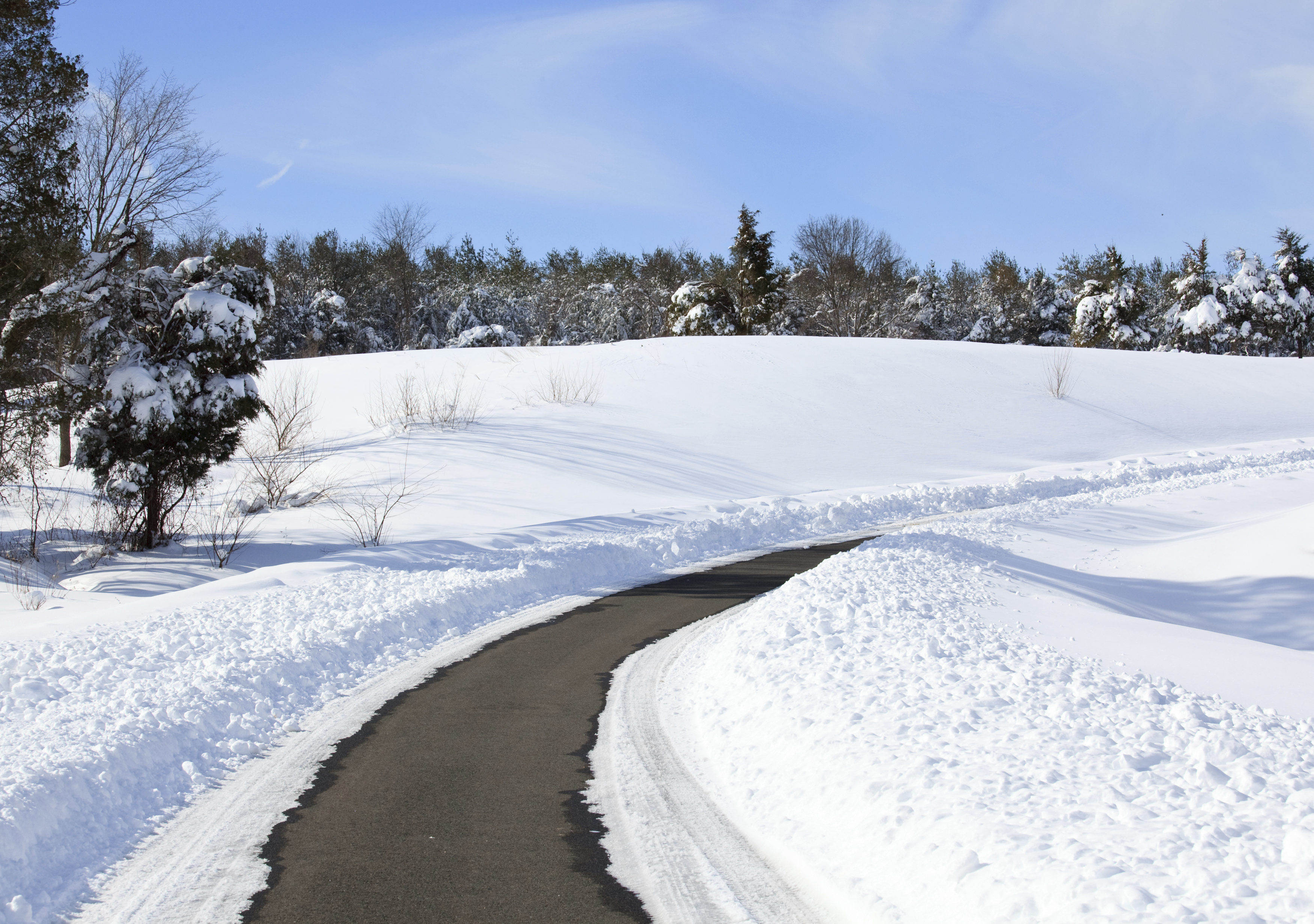 Empty Road Cleared of Snow