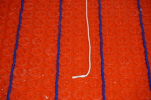 Floor Heat Sensor Probe installed in Warmup's DCM-PRO Membrane.