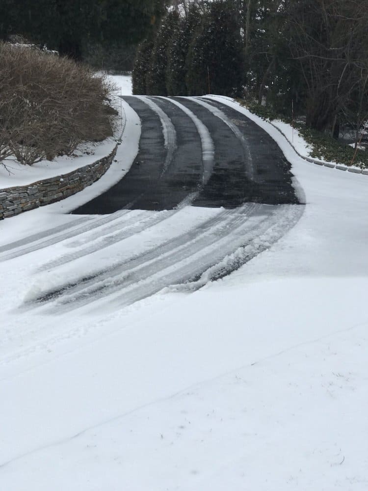 Long curved driveway with a snow melt solution.