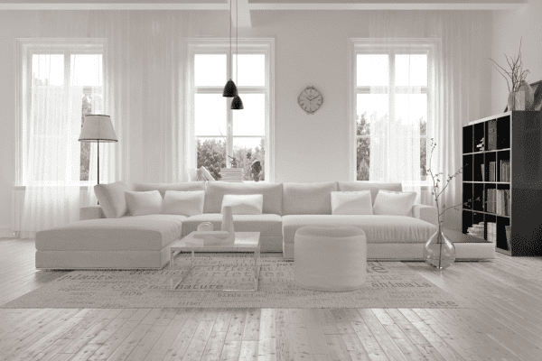 Open white living room with underfloor heating.