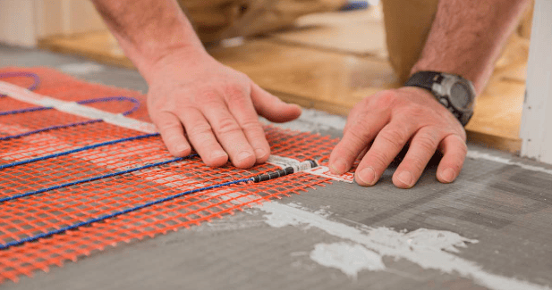 StickyMat underfloor heating installation.
