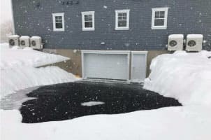Driveway with a snow melting system.