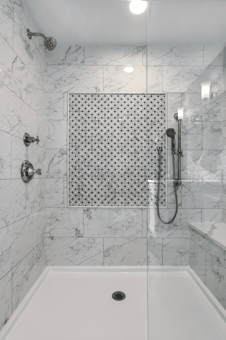 Shower with a bench and radiant heating.