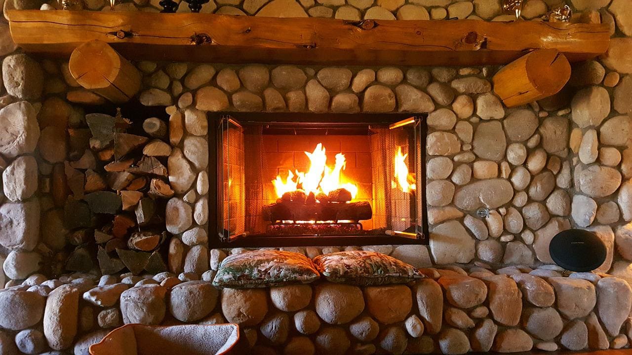 Fireplace in a home to keep cozy.