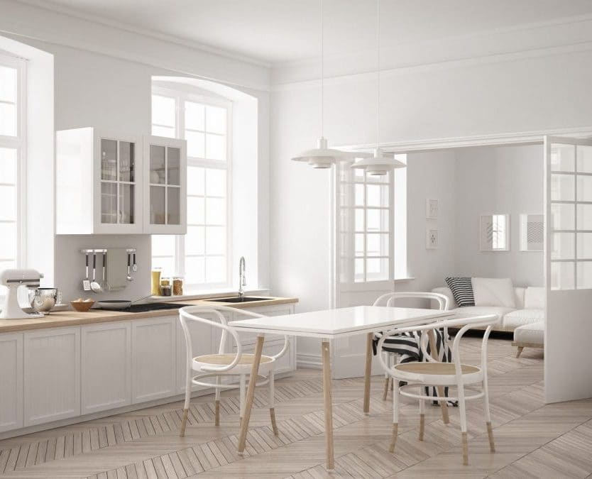 Minimalist white kitchen with radiant heat.