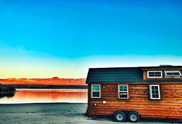 Tiny House travelling home by lake