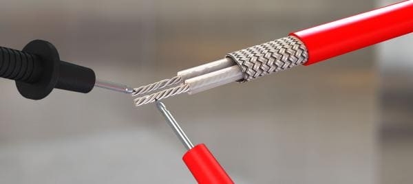Red wire of an underfloor heating system.